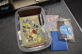 A quantity of mixed stamps and stamp albums, various mostly incomplete and housed in a large clear