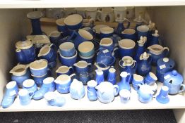 A selection of blue and white glaze motto wares, to include jugs, lidded pots, teapot, condiments