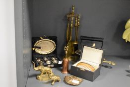 A selection of late 19th to early 20th-century metal sundryware, to include a Hubley Sealyham