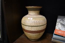 A mid 20th-century West German Dumler and Breiden-style pottery vase, of baluster form, featuring