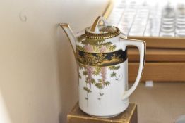 A 20th-century Japanese Koransha porcelain tea set, having floral and foliate decoration with hand