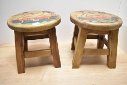 A pair of 20th century oak children stools both featuring a teddy bear design to seat, measure 23.