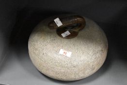 Thought to be early 20th-century Scottish Ailsa Craig Blue Horn granite curling stone, featuring a