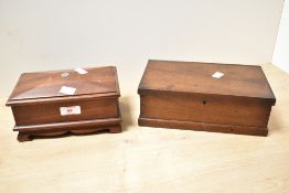 Two Edwardian mahogany hinged boxes, to feature a sarcophagus-shaped jewellery box with a silver