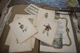 A large scrapbook containing a selection of pictures and prints.