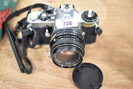 A Pentax ME camera with SMC Pentax -M1:1,7 50mm