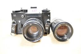 A Zenit 11 35mm SLR camera with a Helios 44 58mm f2 lens. Sold alongside a Soviet Jupiter-IIA 4/