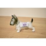 A Royal Dux bone china terrier study, bearing stamp '151 and 74' to underside with pink triangle,