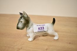 A Royal Dux bone china terrier study, bearing stamp '151 and 74' to underside with pink triangle,