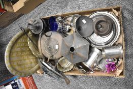 A collection of metal and plated ware.