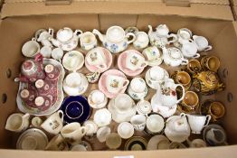 A carton of assorted childrens china part tea services.