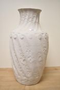 A large late 20th-century pottery vase, of baluster form with a decorative surface, illegible mark