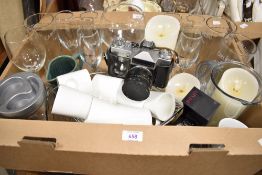 A collection of drinking glasses including a large gin glass, a set of six champagne glasses and