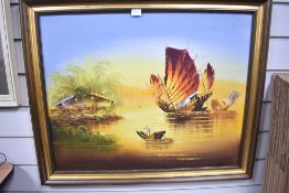 A vintage oil on canvas painting depicting Chinese junk boats at sunset in a textured gold frame