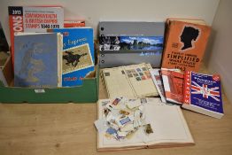 A selection of stamp catalogues and vintage stamp albums etc.