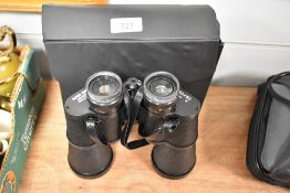 A pair of Super Zenith 20x50 binoculars in carry case.
