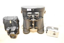 A pair of Wilkinson 10x50 binoculars sells with a Canon Powershot SX510HS digital camera and a Canon