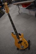A Yamaha bass guitar, model BB1200, in natural finish, believed to be 1970s, serial number 023112,