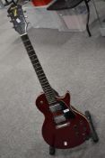 A vintage Harmony Les Paul style solid body electric guitar