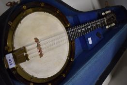 An early 20th Century Bell-Tone mandolin banjo (banjolin) numbered 342874, sold with shaped case
