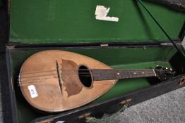 A traditional bowl back mandolin , probably early 20th Century, stamped to body 'Salvatori