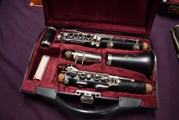 A vintage Buffet Crampon clarinet in fitted case and part antique clarinet or oboe