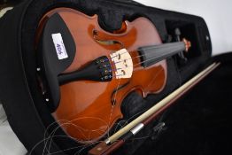 A modern Gear for Music violin and bow, in padded case