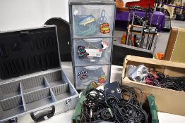 An aluminium multi use tool case, selection of various leads, arranged in set of plastic drawers,