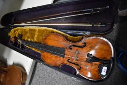 A traditional violin, unlabelled probably 19th Century , having two piece 14 inch back, in nice