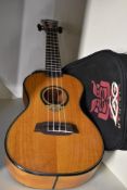 A modern LAG Ukulele, Concert model U77C, serial number 1106YY00438, sold with padded branded case