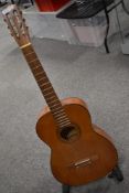 A traditional Spanish classical guitar, labelled internally Angelica model 284 sold by Boosey &