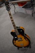 An Aria FA70 electric jazz guitar, left handed, serial number 106050407