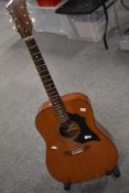 An Italian Melody 6 string acoustic guitar, model 500