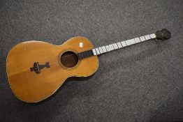 An antique 4 string tenor guitar , probably early 20th Century unlabelled, with mother of pearl