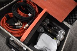 Six Shure SM58 Microphones, leads and four space gauze shield, in cobra carry case