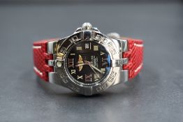 A Breitling Galactic 30 wristwatch, the black metallic dial having Roman numerals and date