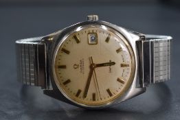 A gents Omega Automatic Geneve wrist watch having a gold plated baton dial with date aperture on
