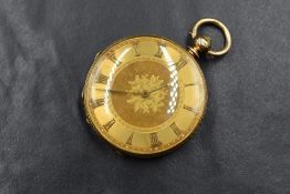 An 18ct gold open face key wound pocket watch, the golden dial having Roman numerals with central