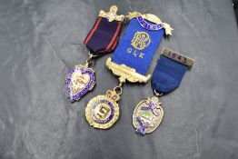 Three silver medals including Blackburn & District retail grocers association, Manchester Unity