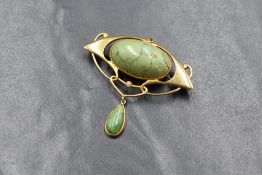 A 15ct gold Art Nouveau Murrle Bennett & Co. turquoise and seed pearl set brooch, the sinuous