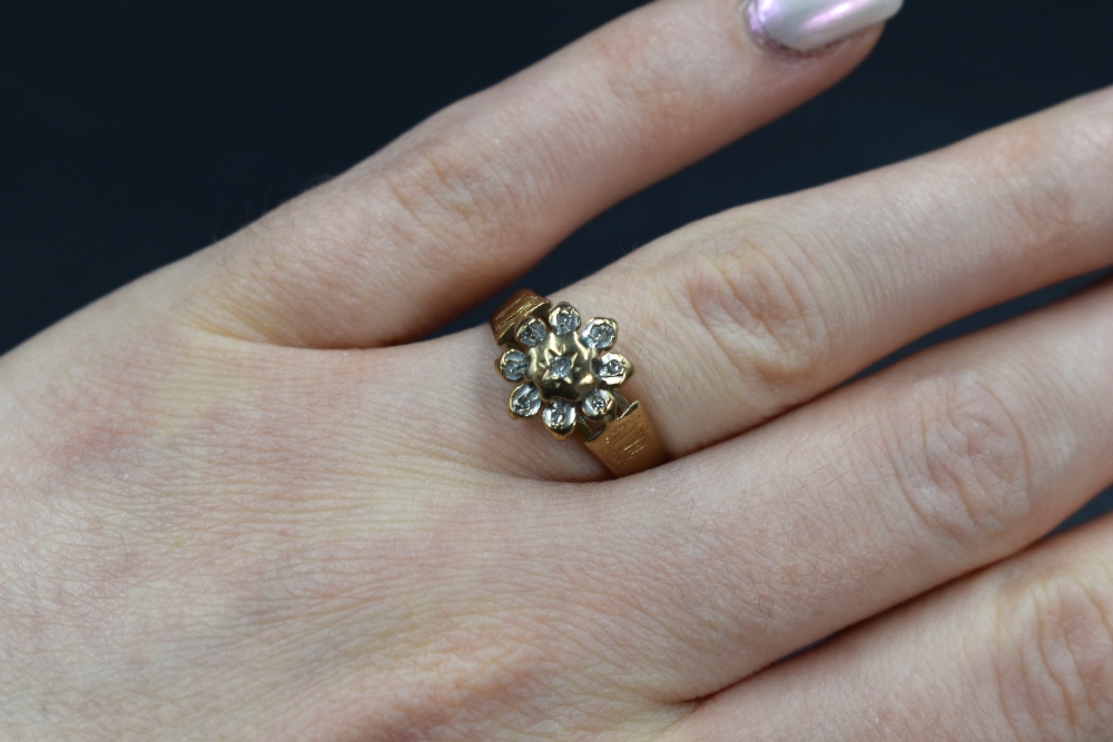 A 9ct gold diamond set cluster ring, the central diamond in an eight illusion diamond chip set - Image 3 of 3