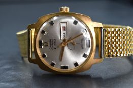 An Omega 21 Prix automatic wristwatch, the silver tone dial having day and date aperture and