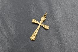 A 9ct gold cross pendant, having decorative beadwork to the front, marked 375, 1.2g