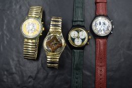 A group of four Swatch watches, comprising Flex White Onyx, Golden Globe, Atz Eco and Rollerball,