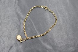 A 9ct gold curb link bracelet with coffee bean charm, apptox 1.5g