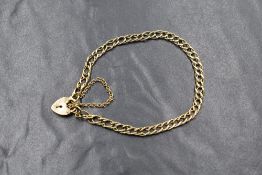 A 9ct gold double curb link bracelet with padlock clasp, approx 5.8g