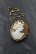 A 9ct gold mounted cameo brooch, the bezel set cameo depicting the Goddess Selene, in a bezel