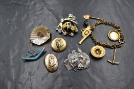 A silver and enamel boomerang and southern cross constellation brooch, along with a silver Australia