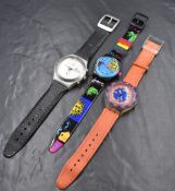A group of three Swatch wristwatches, comprising Musicall Europe in Concert, Scuba Red Island and