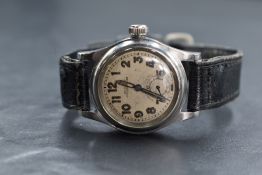 An Oyster Junior Sport wristwatch, the champagne dial having Arabic numerals and subsidiary dial